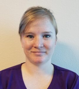 Occupational therapist offering specialized therapy at New Beginnings.